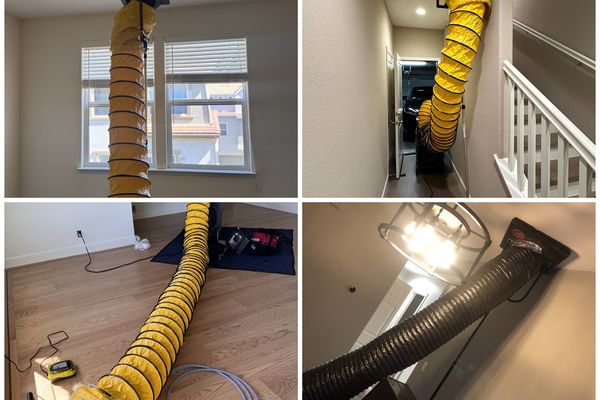 Collection hoses run to vents in different rooms during air duct cleaning