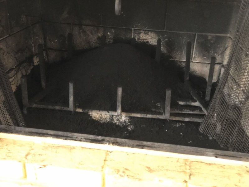 Chimney inspection during a fall maintenance visit