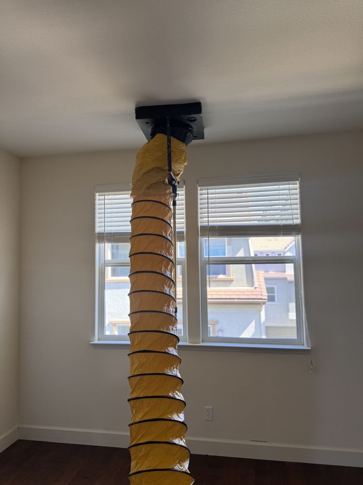 Flex duct routed to a ceiling plenum during duct cleaning