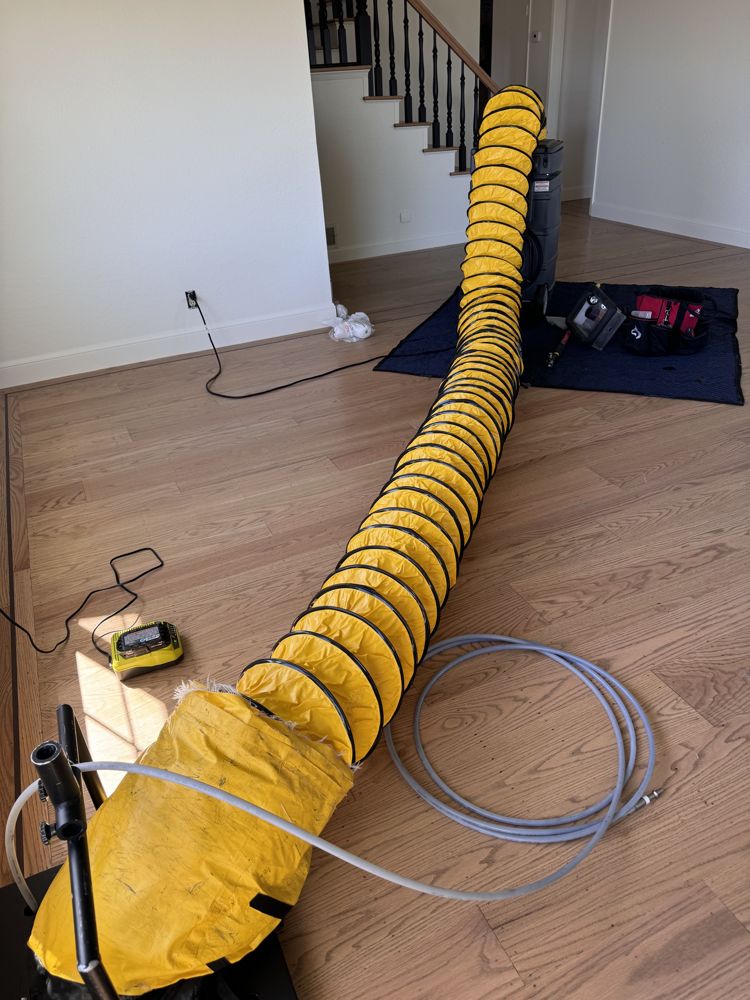Flex duct rig staged through a home during air duct cleaning