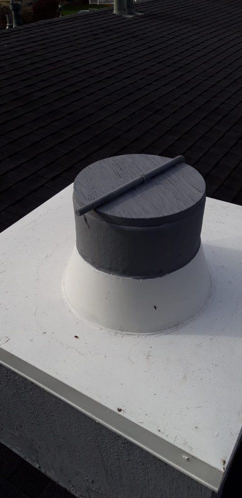 Chimney cap installed on residential chimney