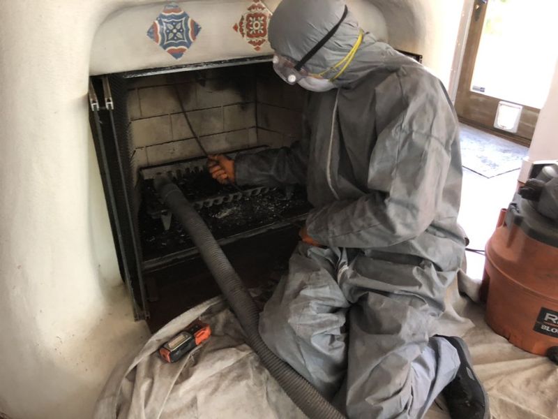 Chimney inspection by Cal Duct Cleaning technician